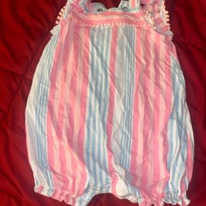 6 months Carter’s romper shorts. Used normal wear